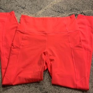 Fabletics Neon Coral Cropped High-Waisted Pocket Leggings, size S